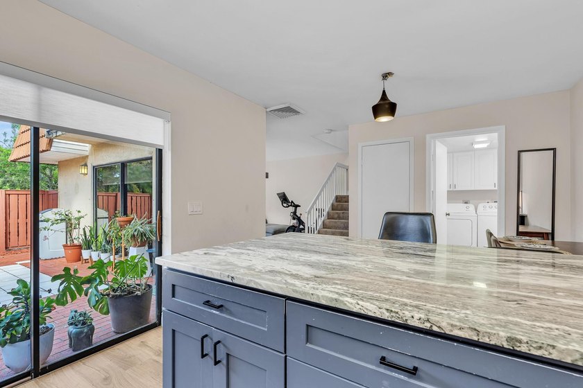 This spacious, light-filled residence features a beautifully - photo 12