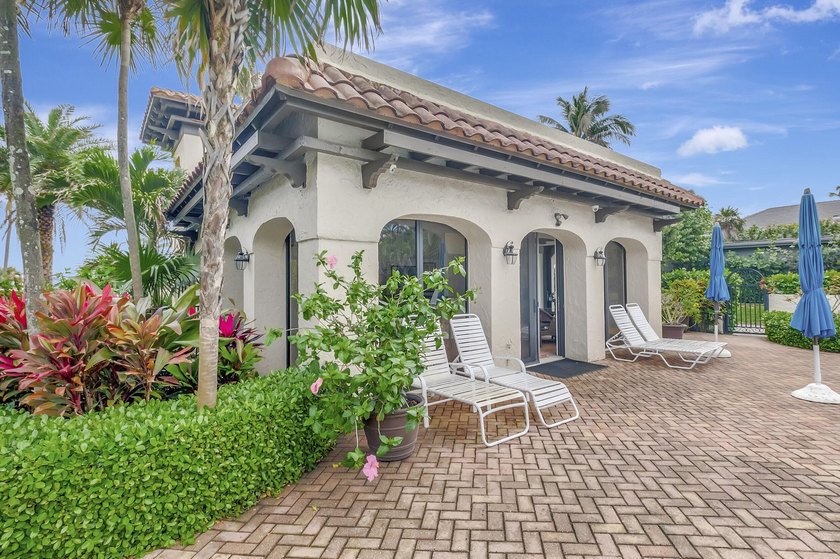 Envision residing just steps away from the serene beachfront of - photo 13
