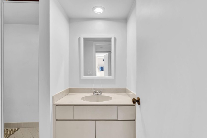 This spacious, light-filled residence features a beautifully - photo 24