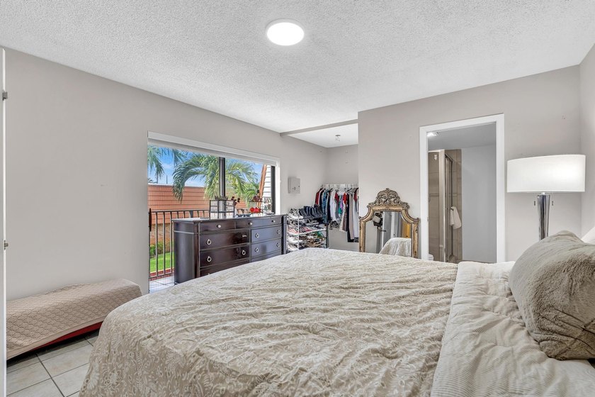 This spacious, light-filled residence features a beautifully - photo 28