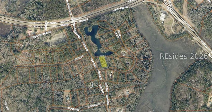 This 1.02 acre wooded lot has a rear lagoon view and is located - photo 2