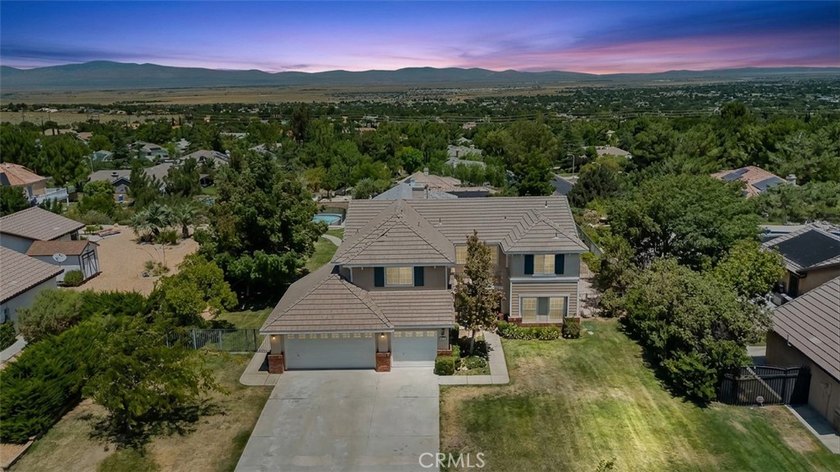 Welcome to 5739 Avenida Entrada, a spacious 5-bedroom - photo 2