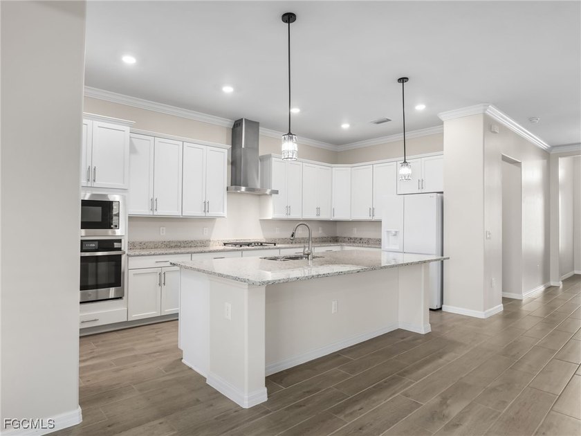 Live where others vacation in this Calusa model, overlooking the - photo 8
