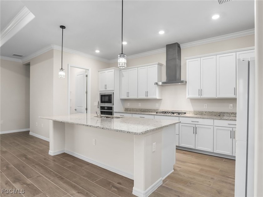 Live where others vacation in this Calusa model, overlooking the - photo 9
