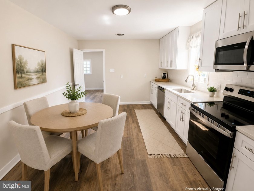 Renovated in 2026 and ready for its new owner! The updated - photo 8