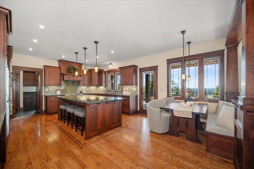 Set at the top of gated Broadmoor Estates, one of the area's - photo 11