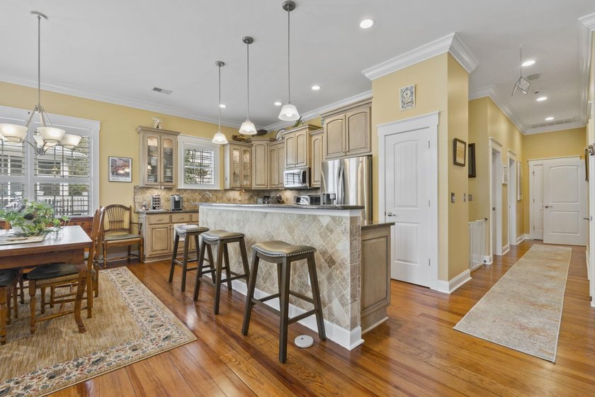 Four-bedroom, three-bathroom, elevated coastal home with a - photo 5