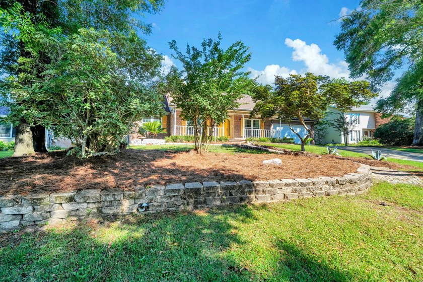 Rarely available in Niceville, this single-level pool and spa - photo 4