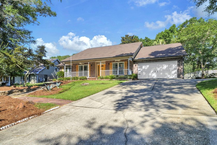 Rarely available in Niceville, this single-level pool and spa - photo 8