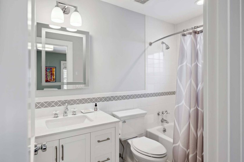 Set beside a 51-acre reserve and moments from the bay, this - photo 27