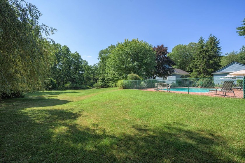 Set beside a 51-acre reserve and moments from the bay, this - photo 36