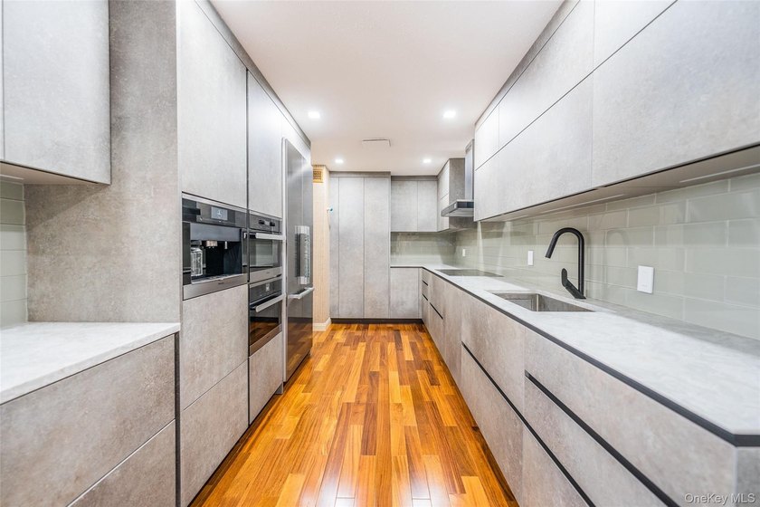 Welcome to this elegant gated condominium in the highly - photo 7
