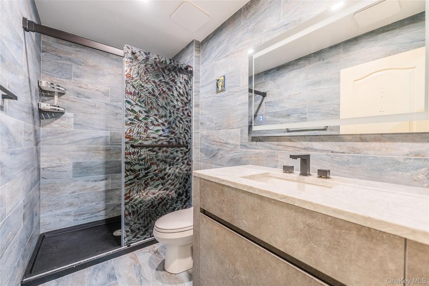 Welcome to this elegant gated condominium in the highly - photo 10