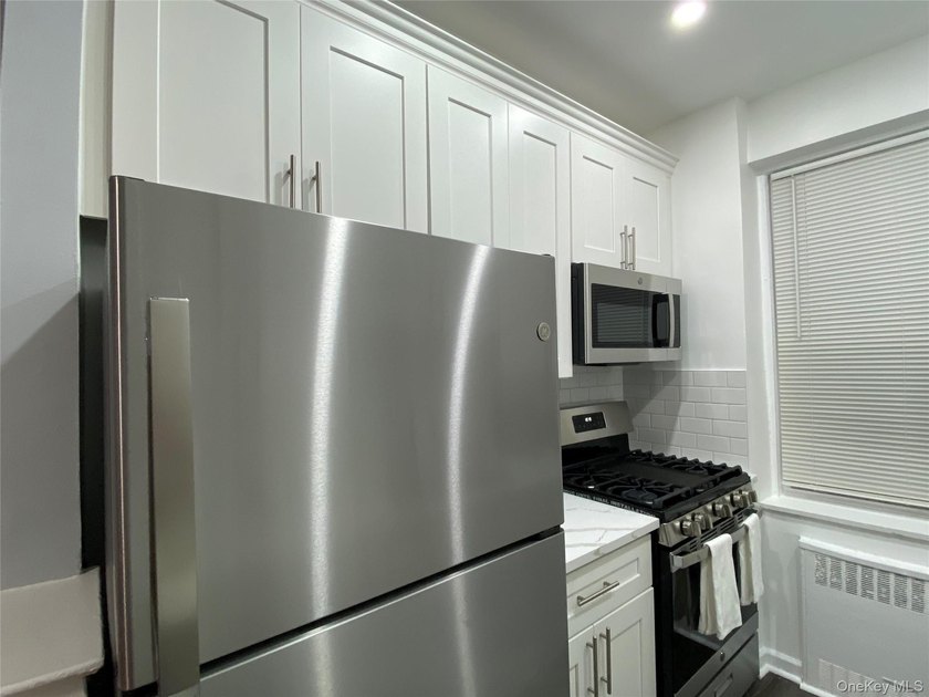 Completely renovated in 2023 this extra large condo unit offers - photo 5