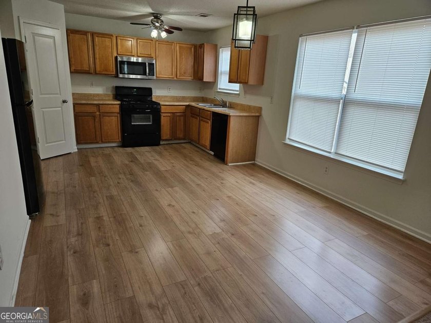 Welcome to this beautifully refreshed 4-bedroom, 2.5-bath home - photo 3