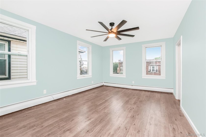 Welcome to this beautiful legal two-family home located in the - photo 6