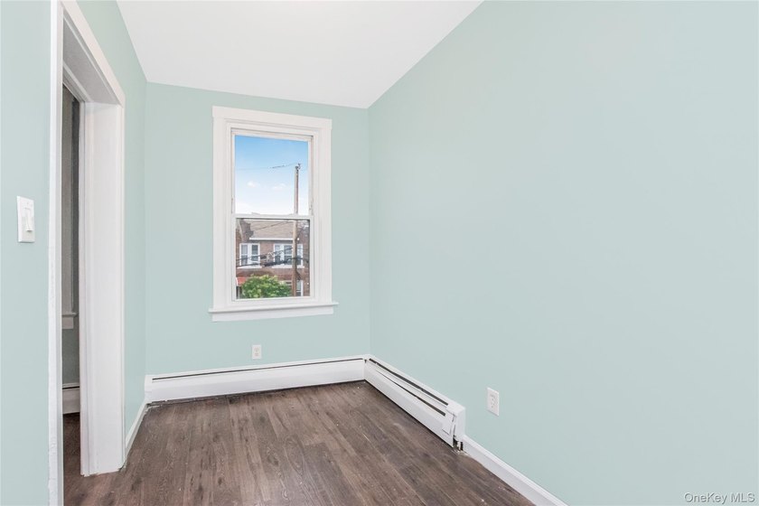 Welcome to this beautiful legal two-family home located in the - photo 7