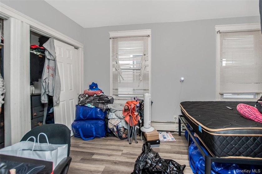 Welcome to this beautiful legal two-family home located in the - photo 10