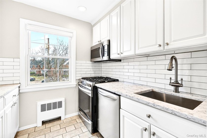 Welcome to this charming two-bedroom co-op located in the - photo 18