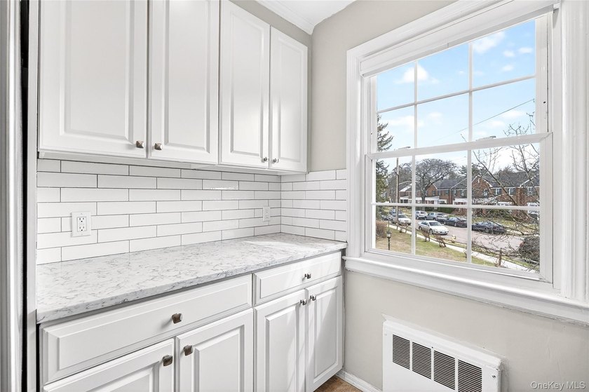 Welcome to this charming two-bedroom co-op located in the - photo 21