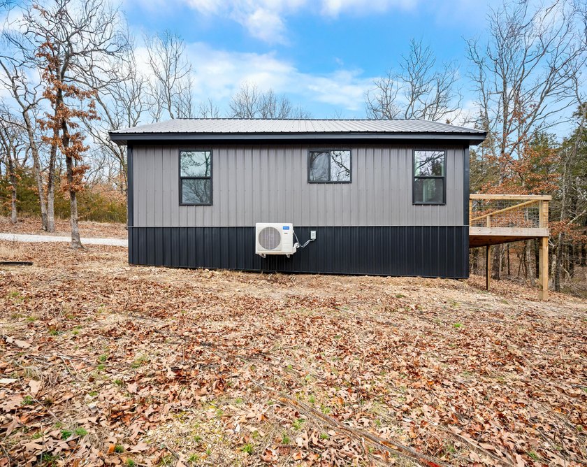 MOTIVATED SELLERS! Beautiful NEW CONSTRUCTION retreat on The - photo 2