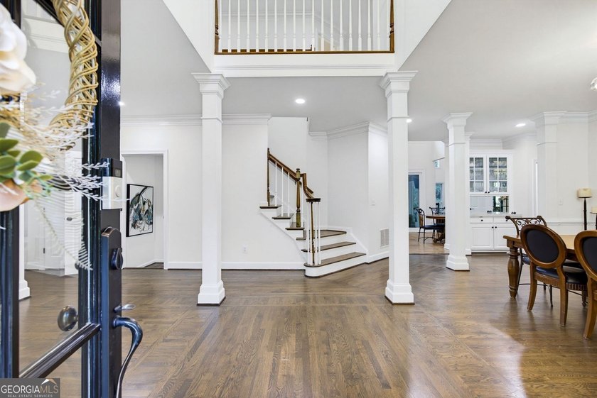 Tucked away on a beautifully landscaped lot of over 1 acre, this - photo 5