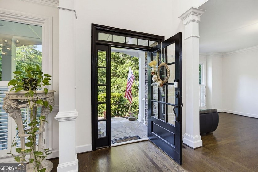 Tucked away on a beautifully landscaped lot of over 1 acre, this - photo 6