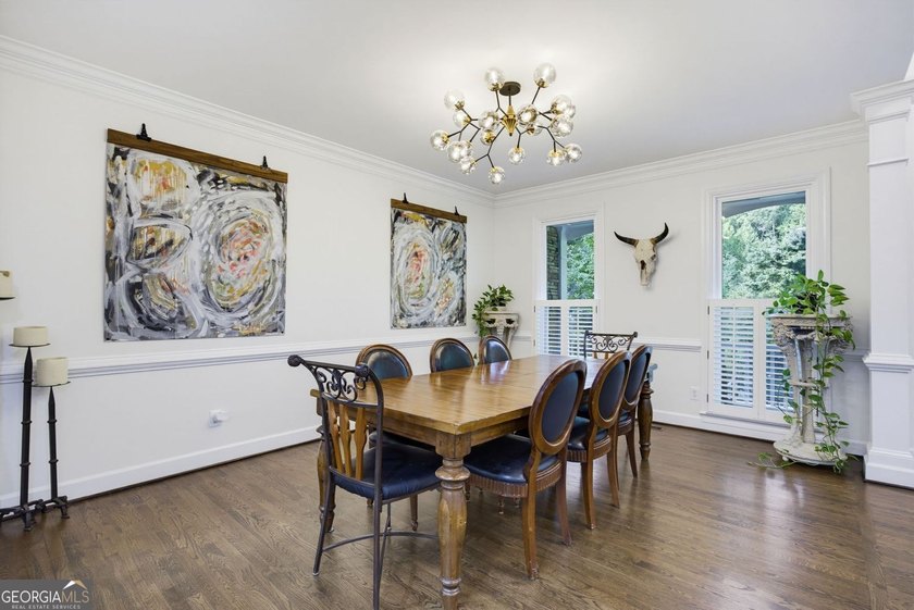 Tucked away on a beautifully landscaped lot of over 1 acre, this - photo 8