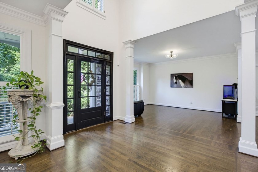 Tucked away on a beautifully landscaped lot of over 1 acre, this - photo 9