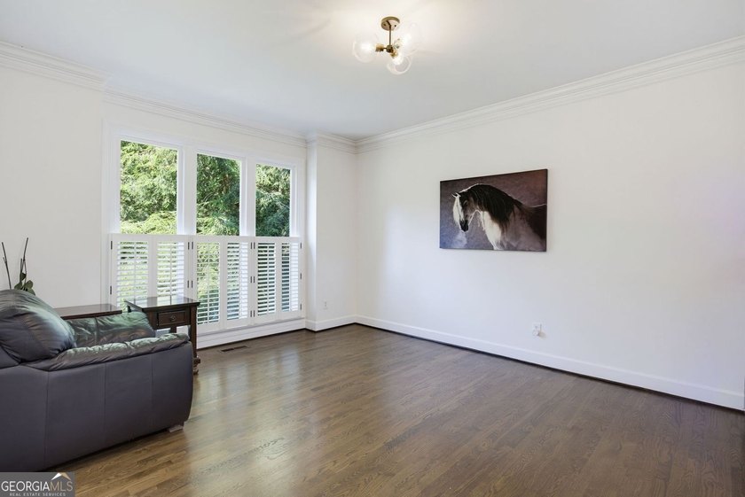 Tucked away on a beautifully landscaped lot of over 1 acre, this - photo 10