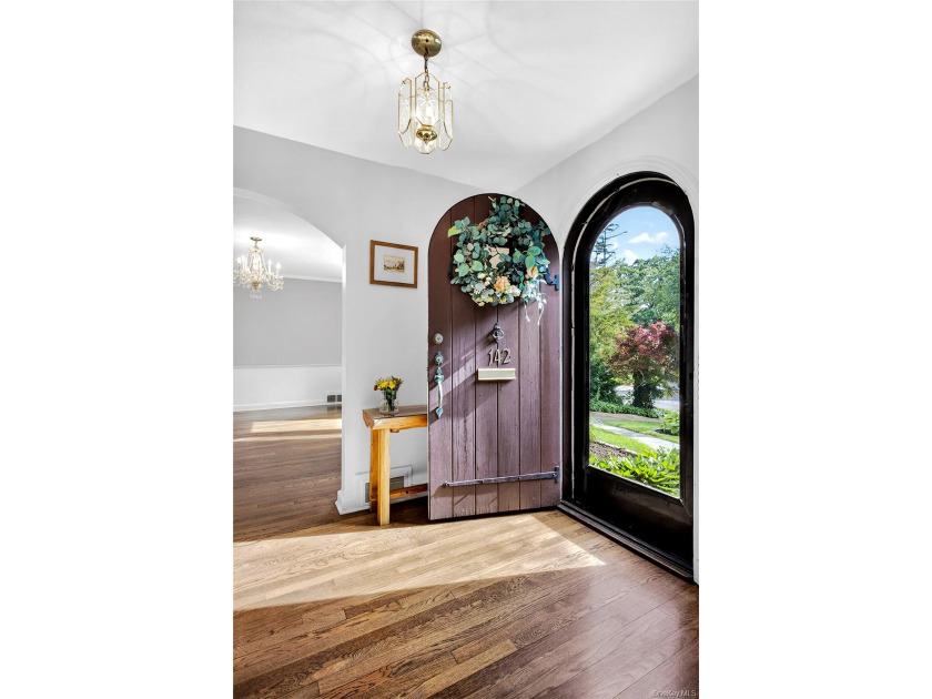 Storybook charm meets timeless elegance in this classic Tudor - photo 3