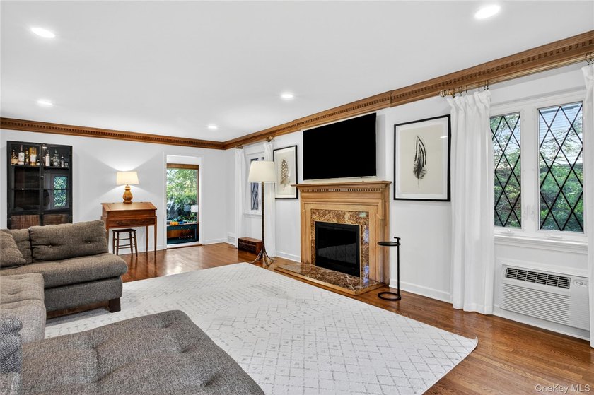 Storybook charm meets timeless elegance in this classic Tudor - photo 6