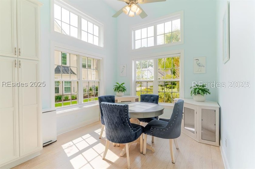 This stunning, end-unit townhome features a grand two-story - photo 13