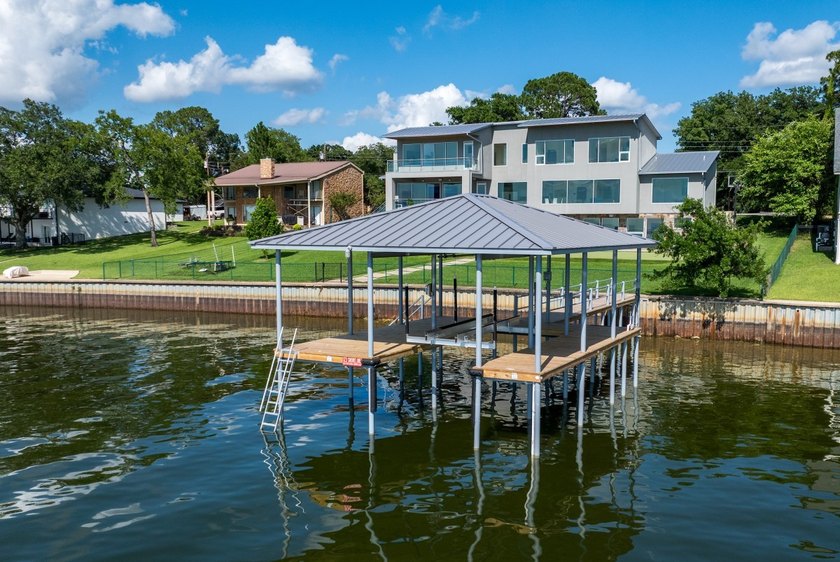 This is the lake house everyone has been waiting for. Positioned - photo 34