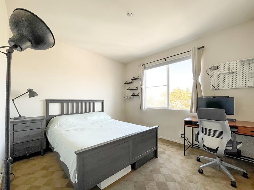 Discover this charming top-floor condo nestled in the - photo 16