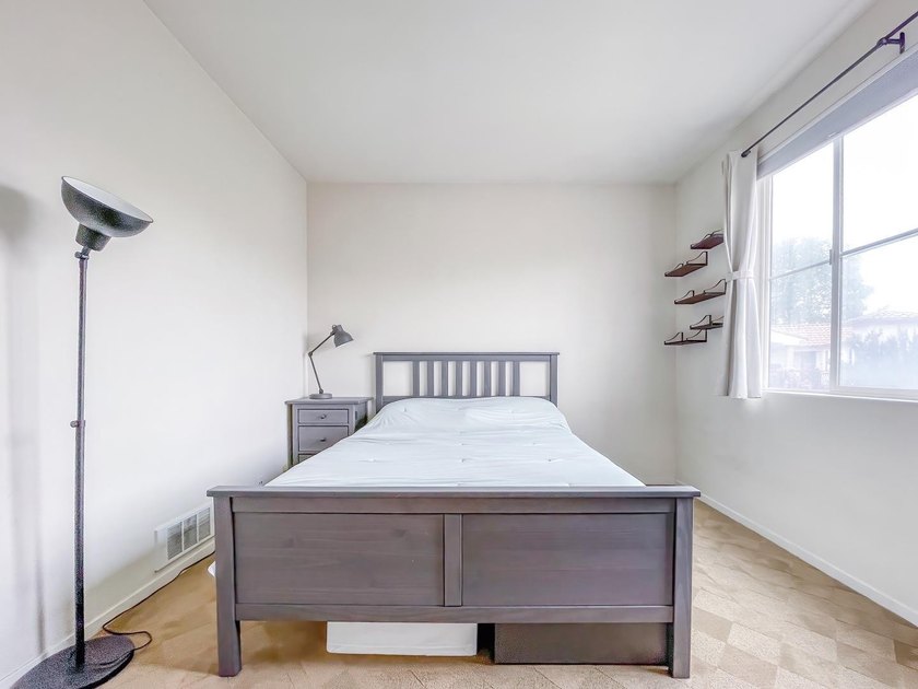 Discover this charming top-floor condo nestled in the - photo 17