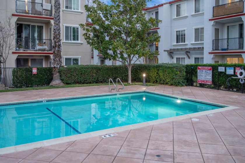 Discover this charming top-floor condo nestled in the - photo 31