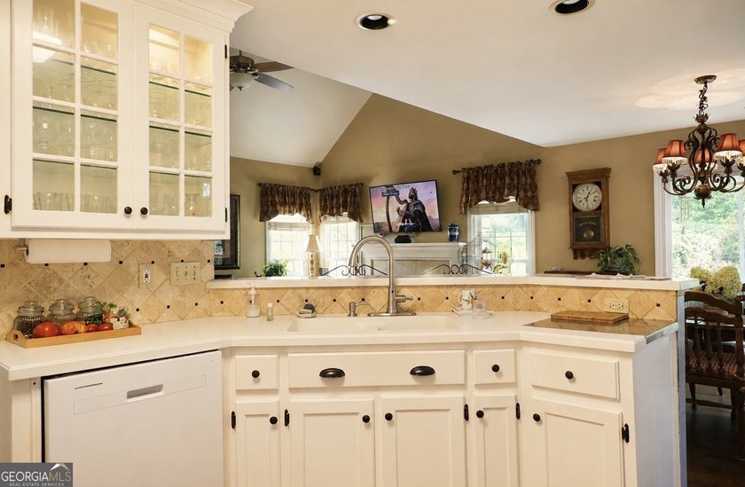 Welcome home to this charming one-level ranch nestled in the - photo 2