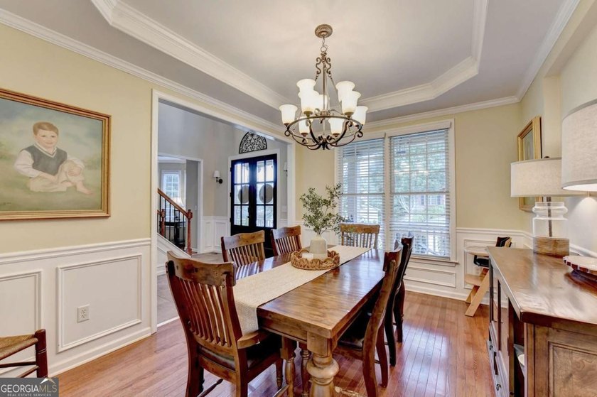 Discover your dream home in Hampton Golf Village! This stunning - photo 3