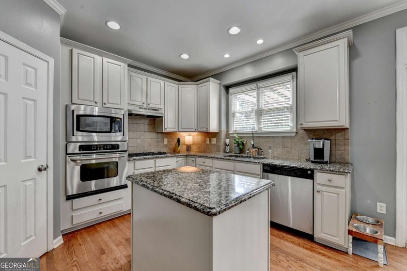 Discover your dream home in Hampton Golf Village! This stunning - photo 8