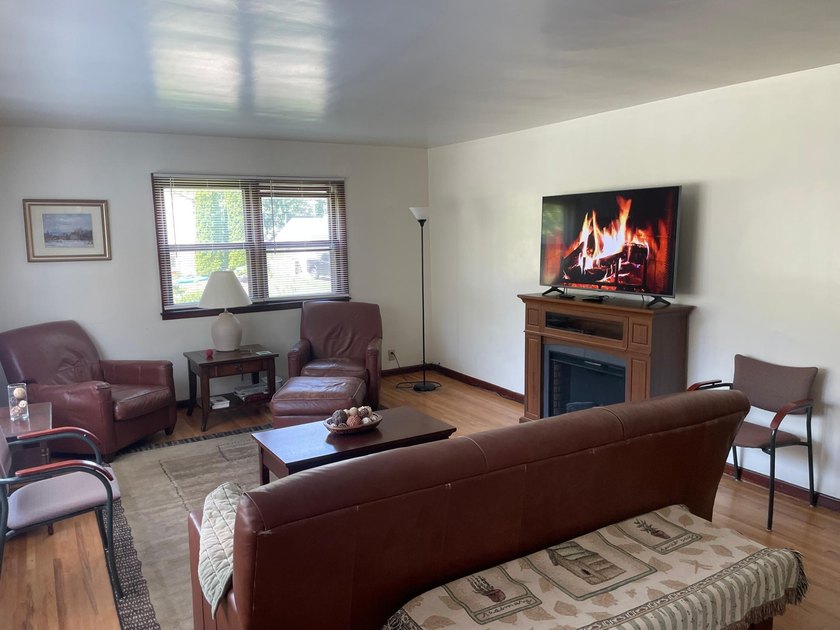 This inviting 4-bedroom, 2 bath home offers a bright layout with - photo 3