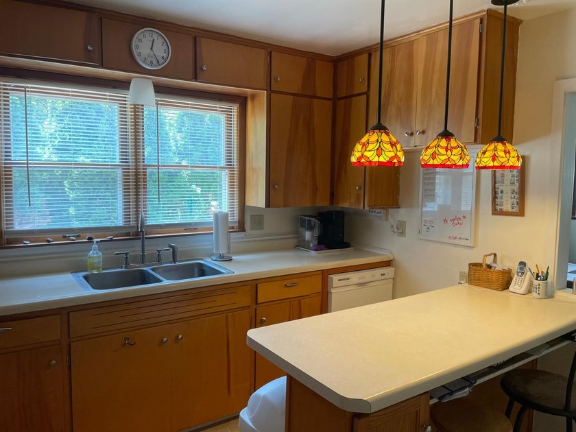 This inviting 4-bedroom, 2 bath home offers a bright layout with - photo 8