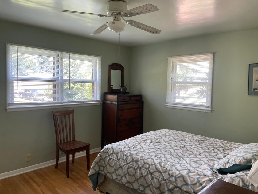 This inviting 4-bedroom, 2 bath home offers a bright layout with - photo 10