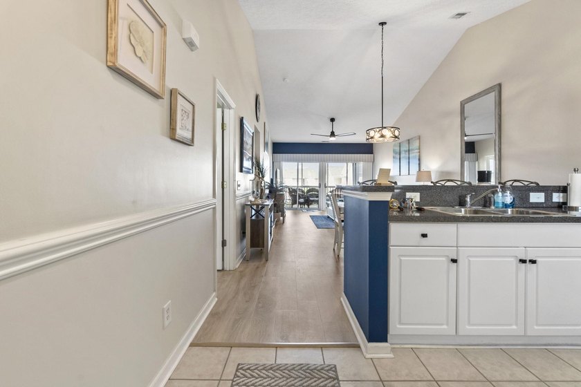 Look at this beautifully furnished 2 bedroom, 2 bath condo - photo 3