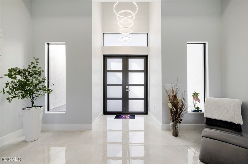Step into luxury waterfront living with this stunning newly - photo 4