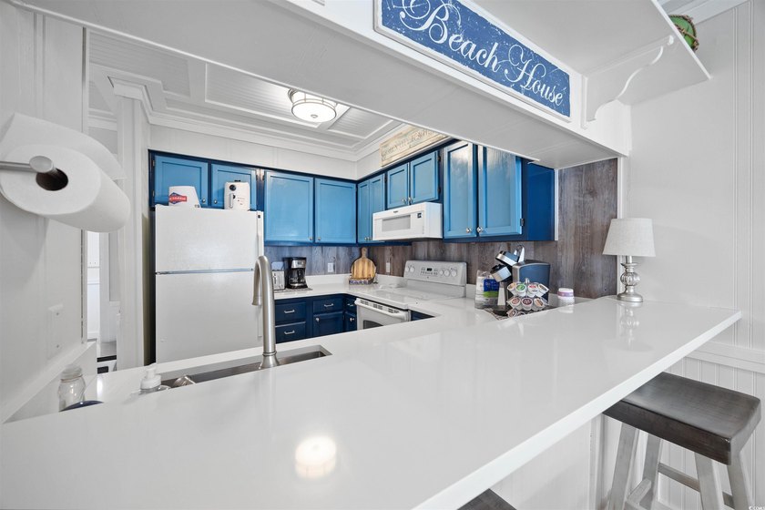 Charming, fully furnished, ocean view condo on Garden City Beach - photo 8