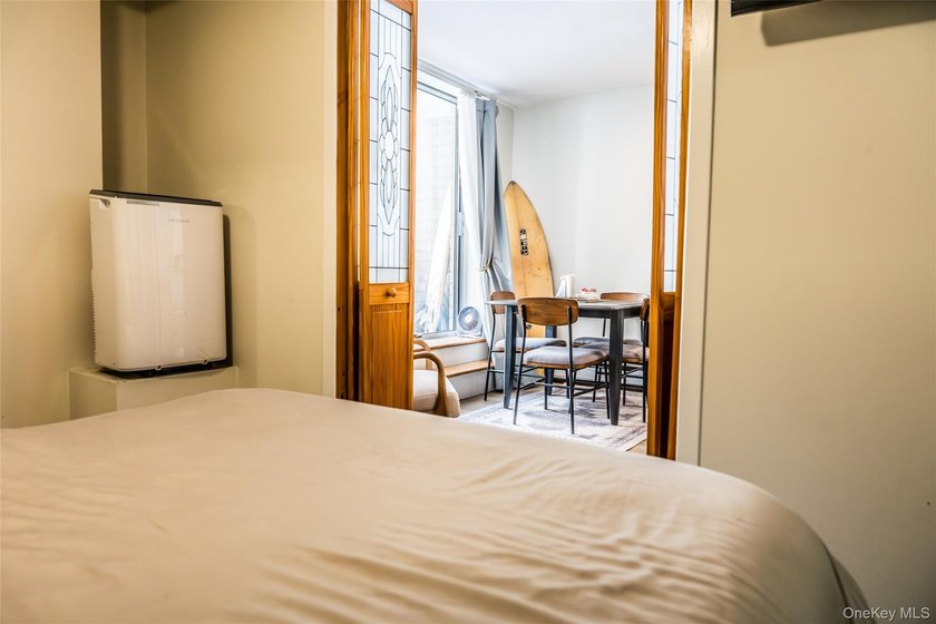 Alcove studio converted to a one-bedroom, offering a flexible - photo 13