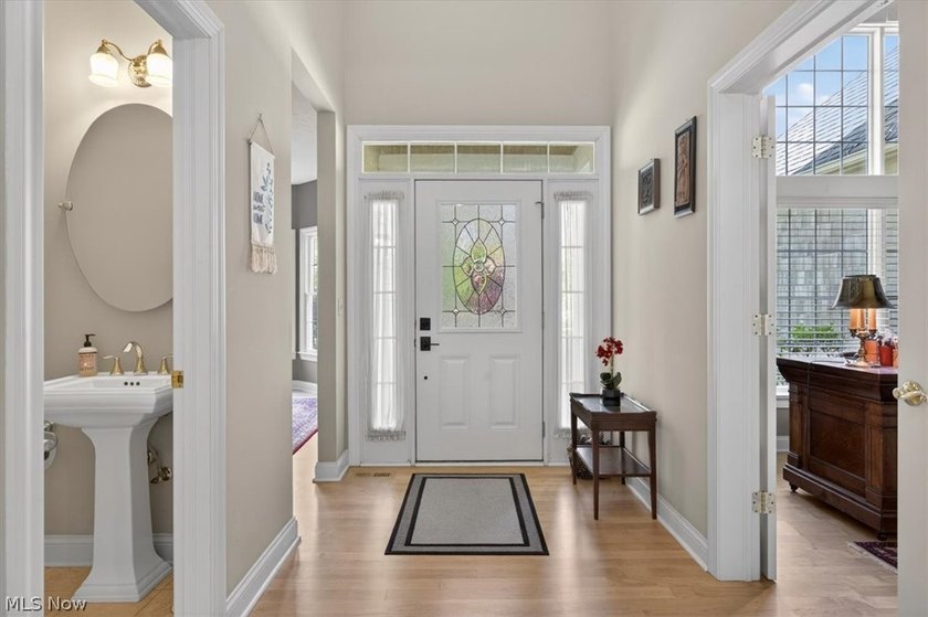 Discover this beautifully updated 3-bedroom cluster home in the - photo 4