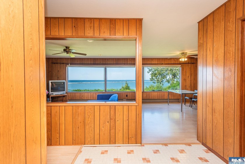 Rare, stunning waterfront property ready for your remodel - photo 11
