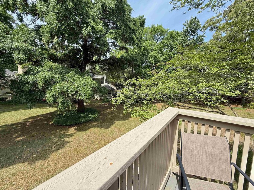 Updated and attractive second-floor end-unit villa featuring two - photo 13